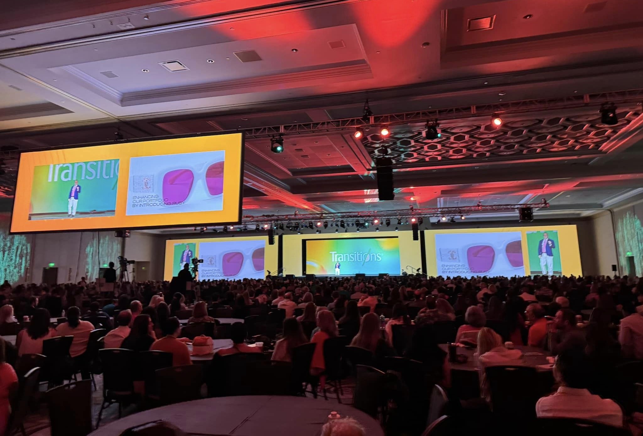 Delay screen with flown front projection at a corporate show in Orlando.