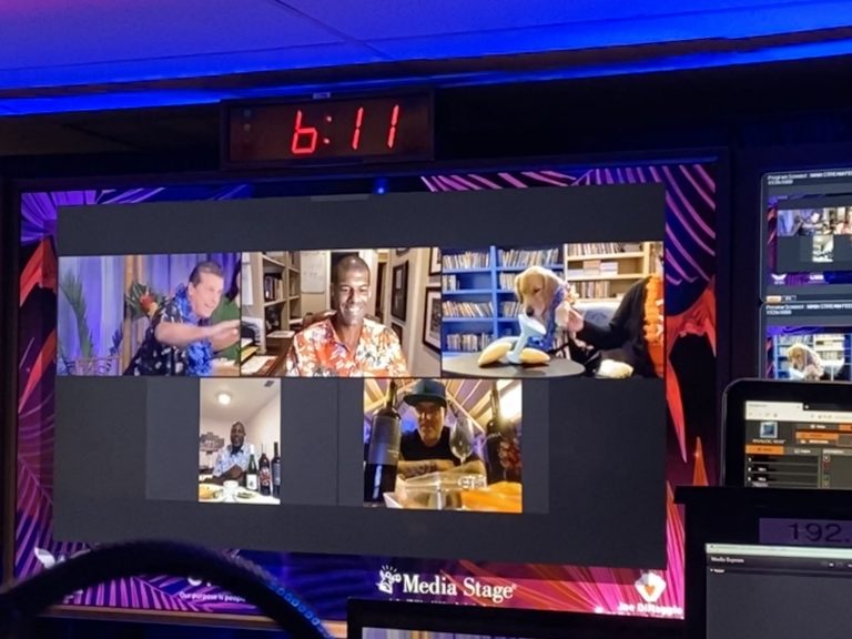 At the screen of the media stage control room appears different shots of the speakers