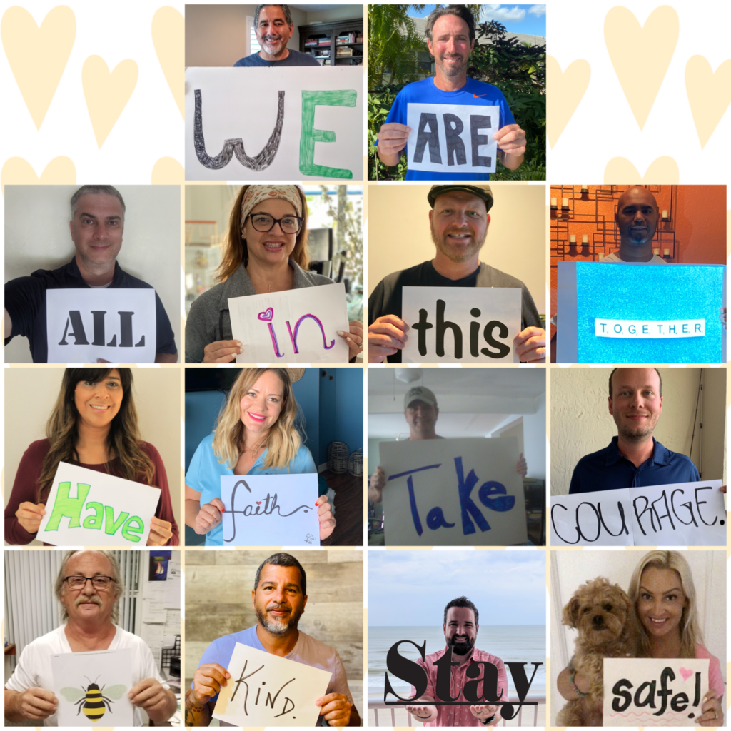 Persons holding a paper with text creating the phrase "We are all in this together have faith take courage bee kind stay safe"